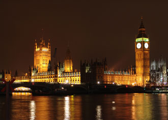 Westminister at night - London city passes House of Parliament at night in London